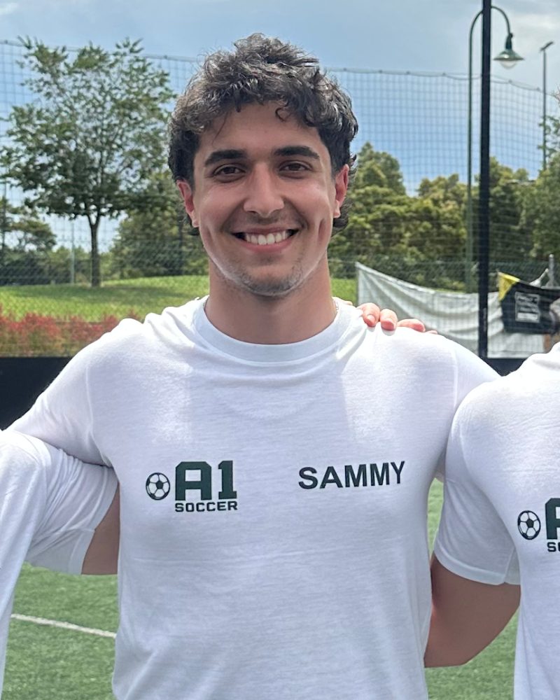 Sammy, head coach of A1 Soccer Academy, in his A1 coach shirt